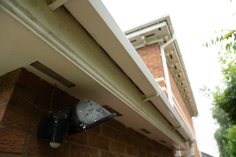 Clean bright white fascia soffit and gutter exterior after professional uPVC cleaning showing restored finish in Nottingham